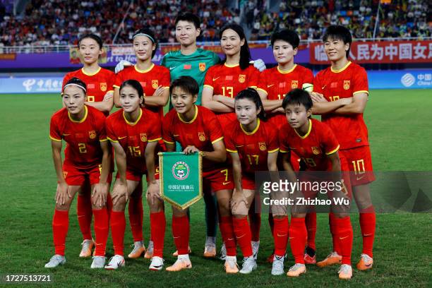 Players of China line up for team photo during the 19th Asian Games Women's Semifinal match between China and Japan at Linping Sports Centre Stadium...