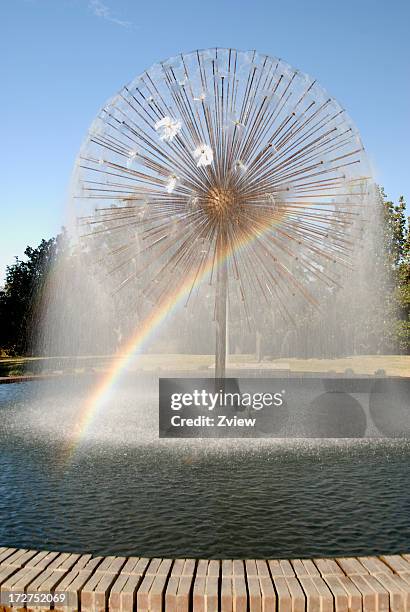 spraying spherical water fountain with rainbow - falls texas stock pictures, royalty-free photos & images