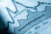 Folded sheet of paper with an unemployment graph on