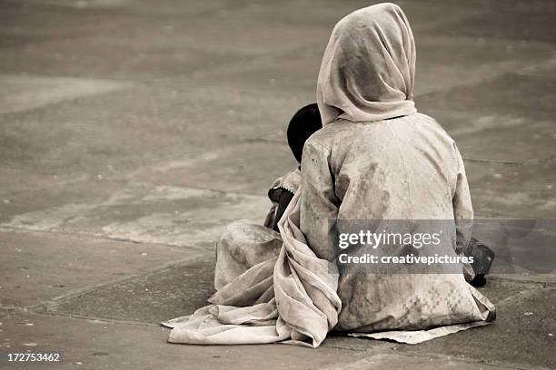 flame of hope - orphan child stock pictures, royalty-free photos & images