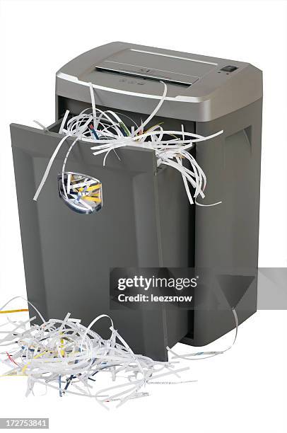 overflowing paper shredder meaning identity theft prevention - paper shredder on white stock pictures, royalty-free photos & images