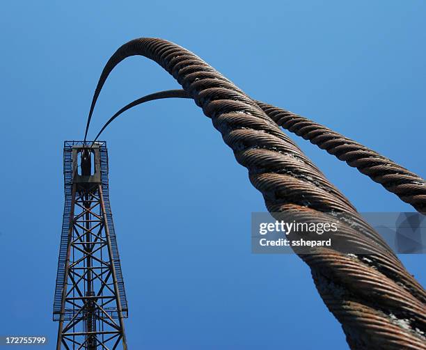 arched cables from a very tall crane - series - wire image bildbanksfoton och bilder