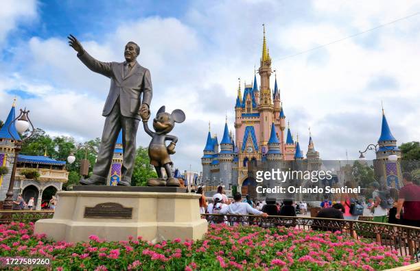 The "Partners" statue of Walt Disney and Mickey Mouse, at Cinderella Castle at the Magic Kingdom, at Walt Disney World, in Lake Buena Vista, Florida,...
