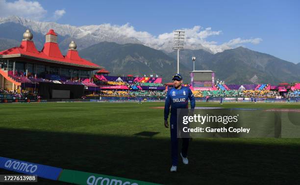 Dawid Malan of England looks on as mountains are seen in the background during the ICC Men's Cricket World Cup India 2023 between England and...