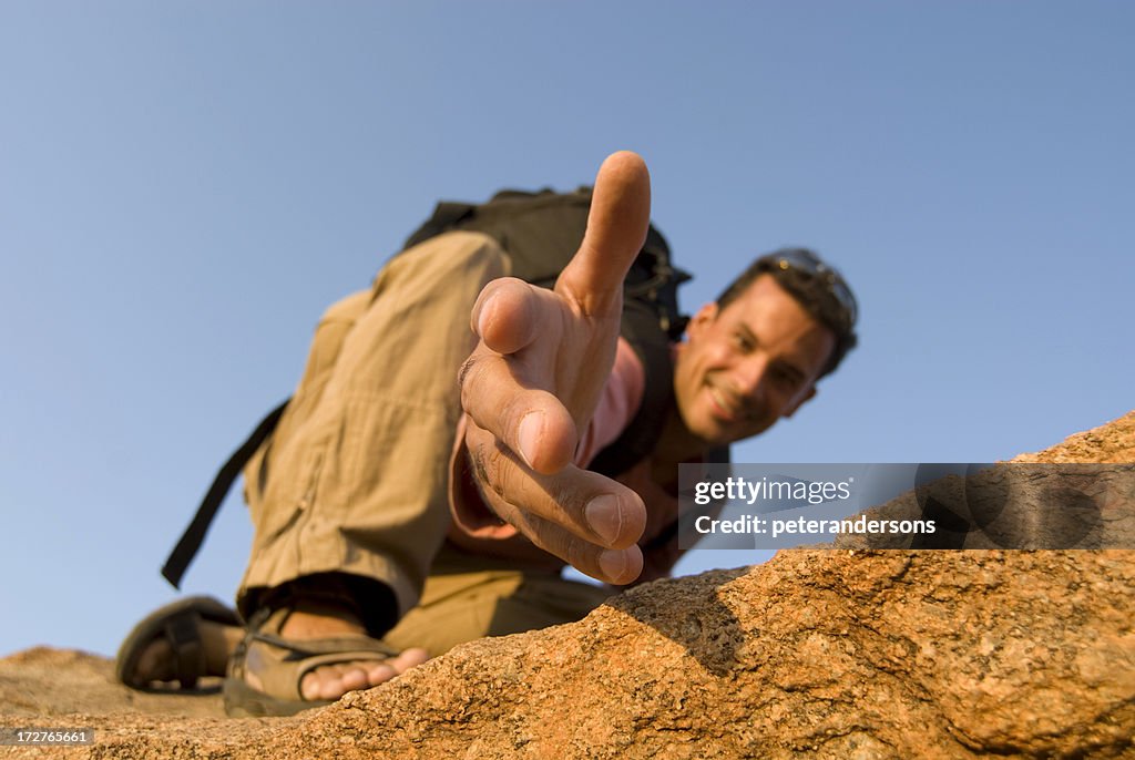 Man offering a hand up