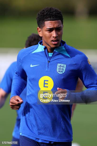 Jude Bellingham of England looks on during a training session at St Georges Park on October 10, 2023 in Burton-upon-Trent, England.