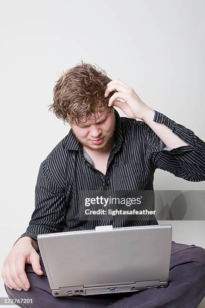 Head Butting Computer Scratching Head Laptop Photos and Premium High Res Pictures - Getty Images
