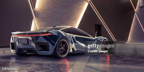 coche deportivo eléctrico en interior arquitectónico - coche del futuro fotografías e imágenes de stock