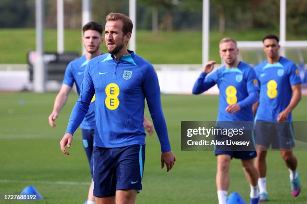 Harry Kane of England looks on during a training session at St Georges Park on October 10, 2023 in Burton-upon-Trent, England.