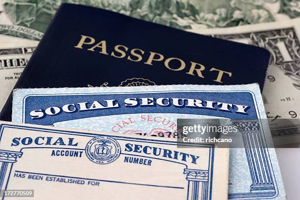 social security cards & passport - social security kaart stockfoto's en -beelden