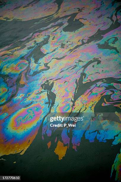 oil slick - oil slick stock pictures, royalty-free photos & images