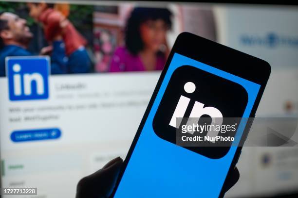 LinkedIn logo displayed on a smartphone with LinkedIn web page seen in the background, in this photo illustration. On 16 October 2023, in Brussels,...