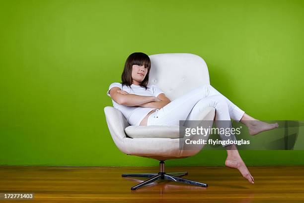 girl in all white - fashion woman floor cross legged stock pictures, royalty-free photos & images