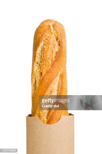a french baguette in a brown paper bag - brown paper isolated stock pictures, royalty-free photos & images