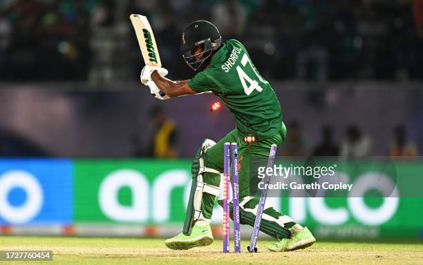 Shoriful Islam of Bangladesh is bowled by Mark Wood of England during the ICC Men's Cricket World Cup India 2023 between England and Bangladesh at...