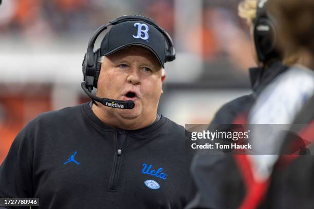 Head coach Chip Kelly of the UCLA Bruins walks on the field against the Oregon State Beavers during the first half at Reser Stadium on October 14,...