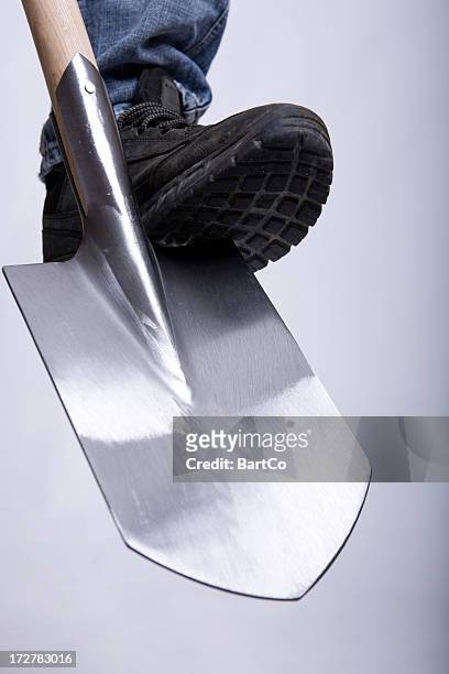 spade with boot - silver boot stock pictures, royalty-free photos & images