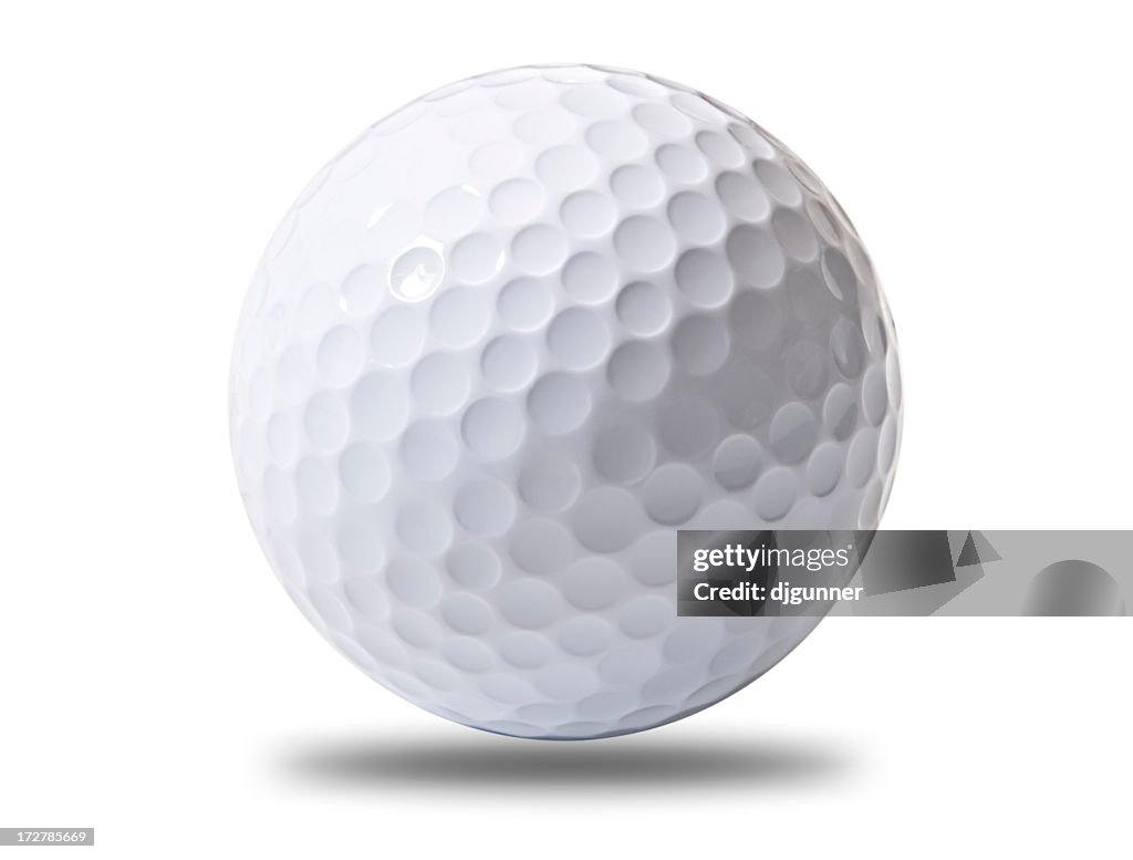 A white golf ball hovering above ground
