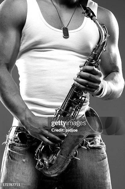 saxophone player - blues music stock pictures, royalty-free photos & images