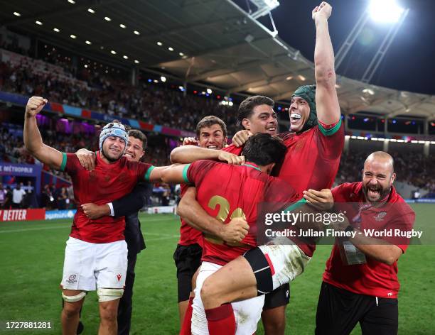 The players of Portugal celebrate victory at full-time having secured their first ever World Cup win following the Rugby World Cup France 2023 match...