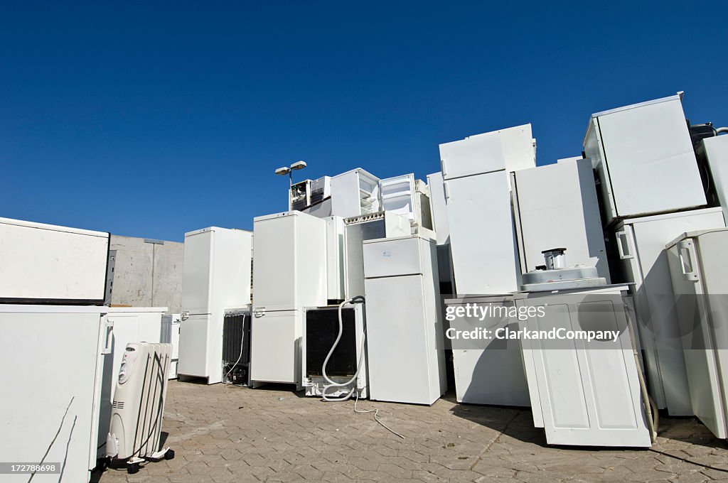 Old Refrigerators Waiting to Be  Scrapped At a Recycling Center