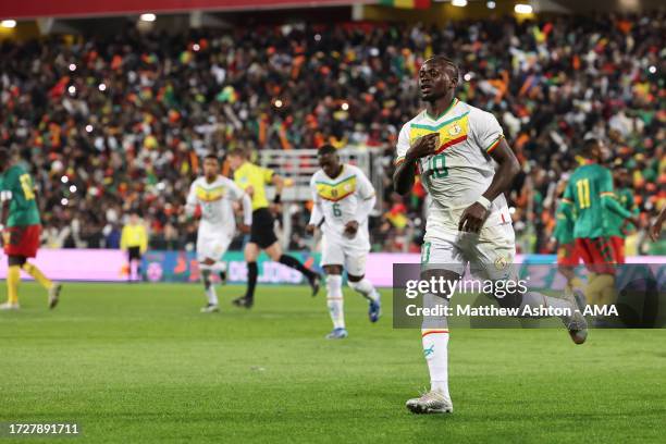 Sadio Mane of Senegal celebrates after scoring a goal to make it 1-0 during the International Friendly match between Senegal and Cameroon at Stade...