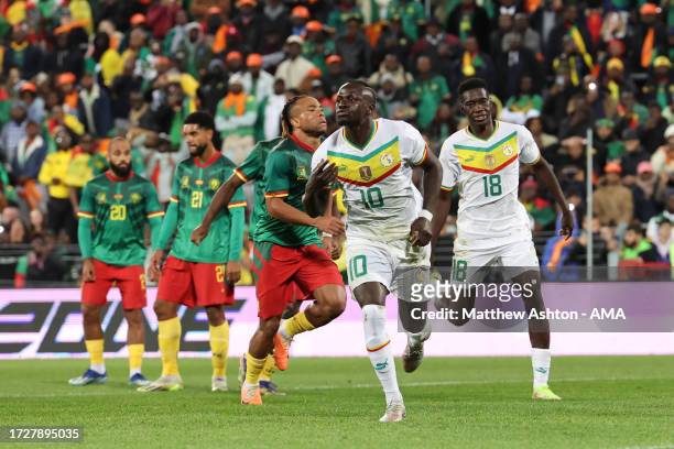 Sadio Mane of Senegal celebrates after scoring a goal to make it 1-0 during the International Friendly match between Senegal and Cameroon at Stade...