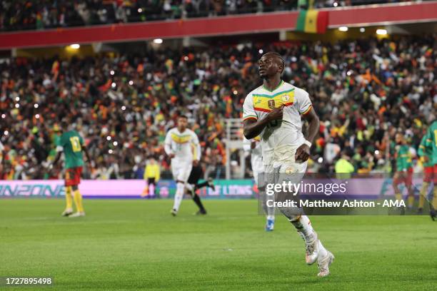 Sadio Mane of Senegal celebrates after scoring a goal to make it 1-0 during the International Friendly match between Senegal and Cameroon at Stade...