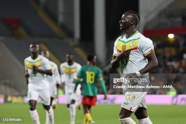 Sadio Mane of Senegal celebrates after scoring a goal to make it 1-0 during the International Friendly match between Senegal and Cameroon at Stade...