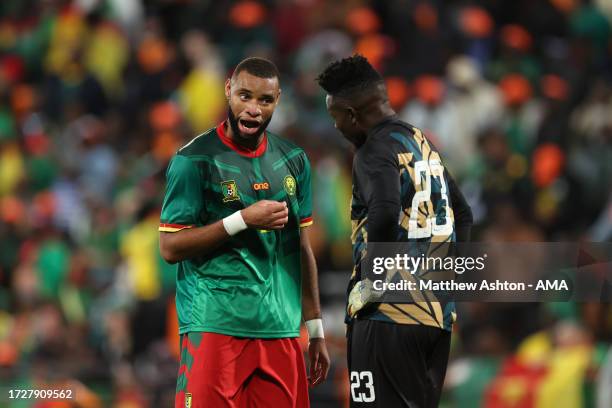 Harold Moukoudi talks to Andre Onana of Cameroon during the International Friendly match between Senegal and Cameroon at Stade Bollaert-Delelis on...