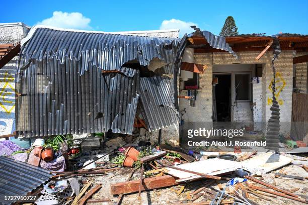 House lies in ruins after an attack by Hamas militants on this kibbutz days earlier near the border with Gaza, on October 10, 2023 in Kfar Aza,...