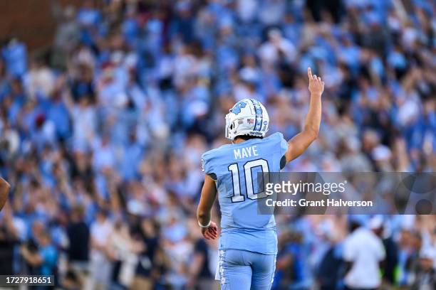 Drake Maye of the North Carolina Tar Heels reacts after throwing for a touchdown Syracuse Orange during the second half of their game at Kenan...