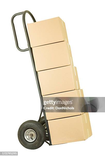 movers dolly with a stack of boxes - brown box stock pictures, royalty-free photos & images