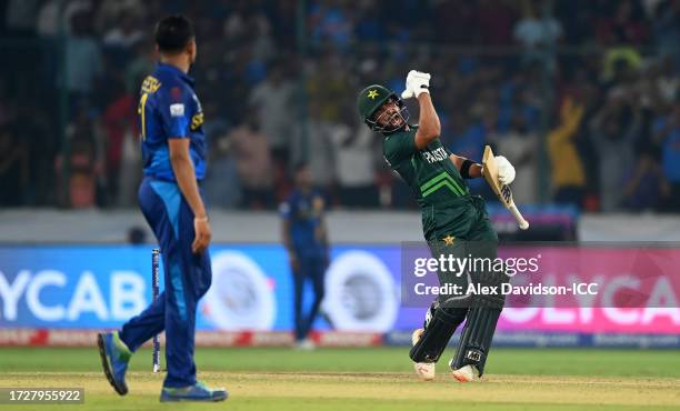 Abdullah Shafique of Pakistan celebrates their century during the ICC Men's Cricket World Cup India 2023 between Pakistan and Sri Lanka at Rajiv...