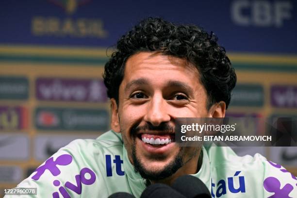 Brazil's defender Marquinhos speaks during a press conference before a training session ahead of the upcoming FIFA World Cup 2026 qualifier football...
