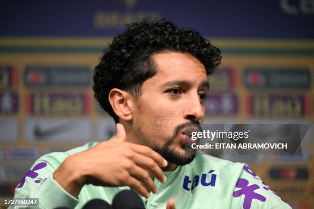 Brazil's defender Marquinhos speaks during a press conference before a training session ahead of the upcoming FIFA World Cup 2026 qualifier football...