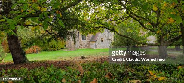 ancient english church in the autumn - circa 14th century stock pictures, royalty-free photos & images