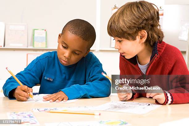 Two Make Homework Two Cute School Boys Doing Homework Together High-Res Stock Photo ...