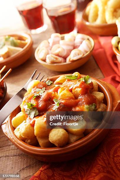 spanish stills: tapas - patatas bravas - patatas bravas stock pictures, royalty-free photos & images