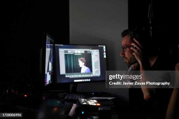 television producer working during filming - broadcast control room stock pictures, royalty-free photos & images