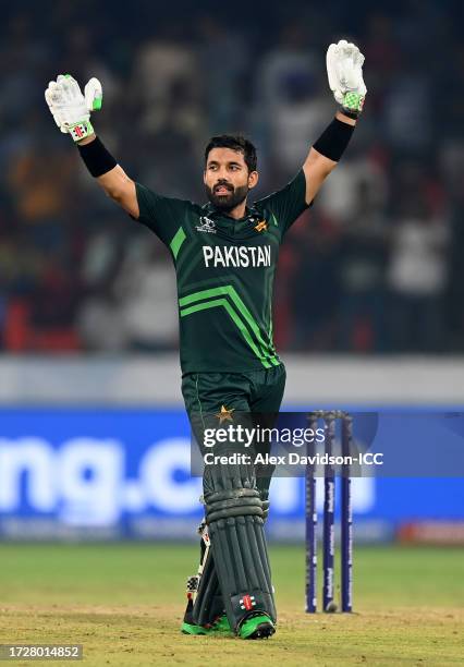 Mohammad Rizwan of Pakistan celebrates their century during the ICC Men's Cricket World Cup India 2023 between Pakistan and Sri Lanka at Rajiv Gandhi...