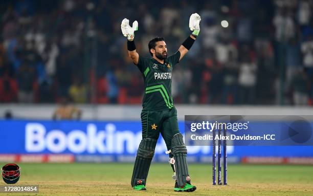 Mohammad Rizwan of Pakistan celebrates their century during the ICC Men's Cricket World Cup India 2023 between Pakistan and Sri Lanka at Rajiv Gandhi...