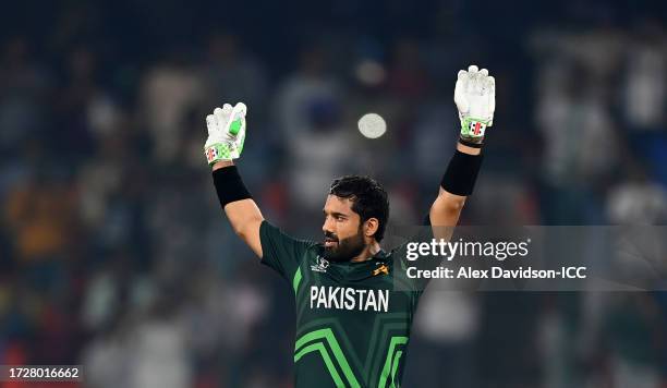 Mohammad Rizwan of Pakistan celebrates their century during the ICC Men's Cricket World Cup India 2023 between Pakistan and Sri Lanka at Rajiv Gandhi...