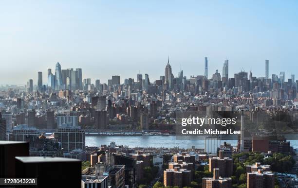 high angle skyline view of midtown manhattan - east river staden new york bildbanksfoton och bilder