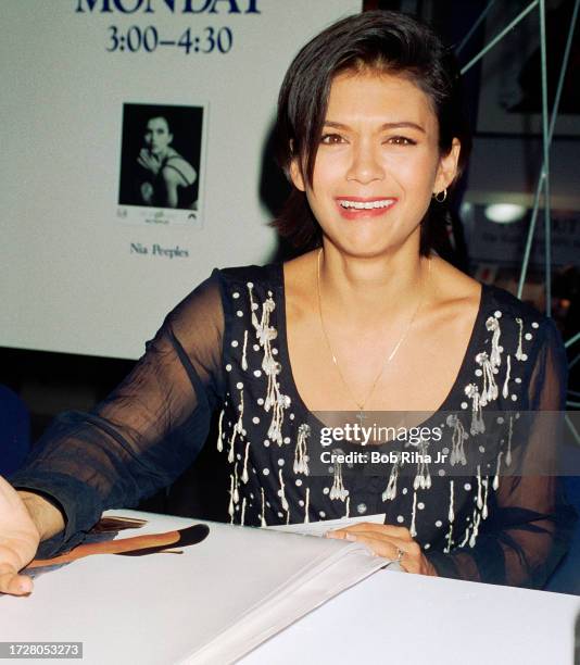 Actress Nia Peeples at signing event to promote workout videos by celebrities, July 28, 1992 in Los Angeles, California.