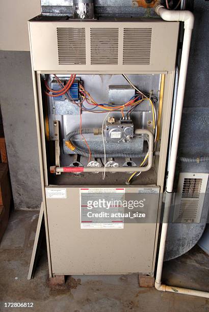 home basement furnace unit - oven stockfoto's en -beelden