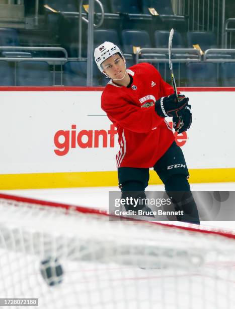 Connor Bedard of the Chicago Blackhawks takes part in the morning skate prior to playing in his first NHL game against the Pittsburgh Penguins at PPG...
