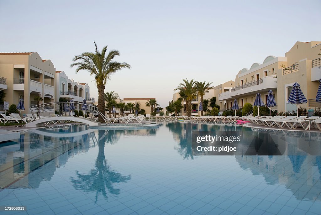 Hotel swimming pool at dawn