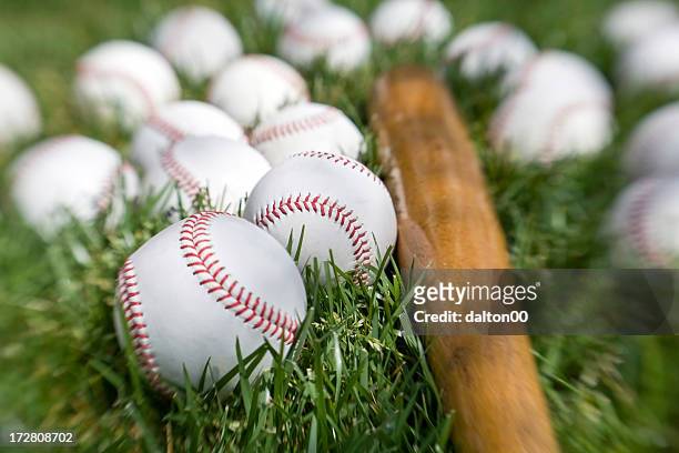 baseballs and bat - baseball bat and ball stock pictures, royalty-free photos & images