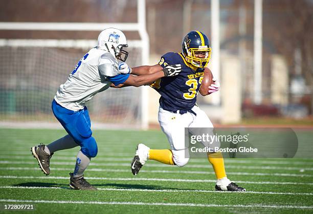 New Mission junior Daniel Soares, was tackled by Burke sophomore Brandon Newton. The New Mission High School and Burke High School football teams...